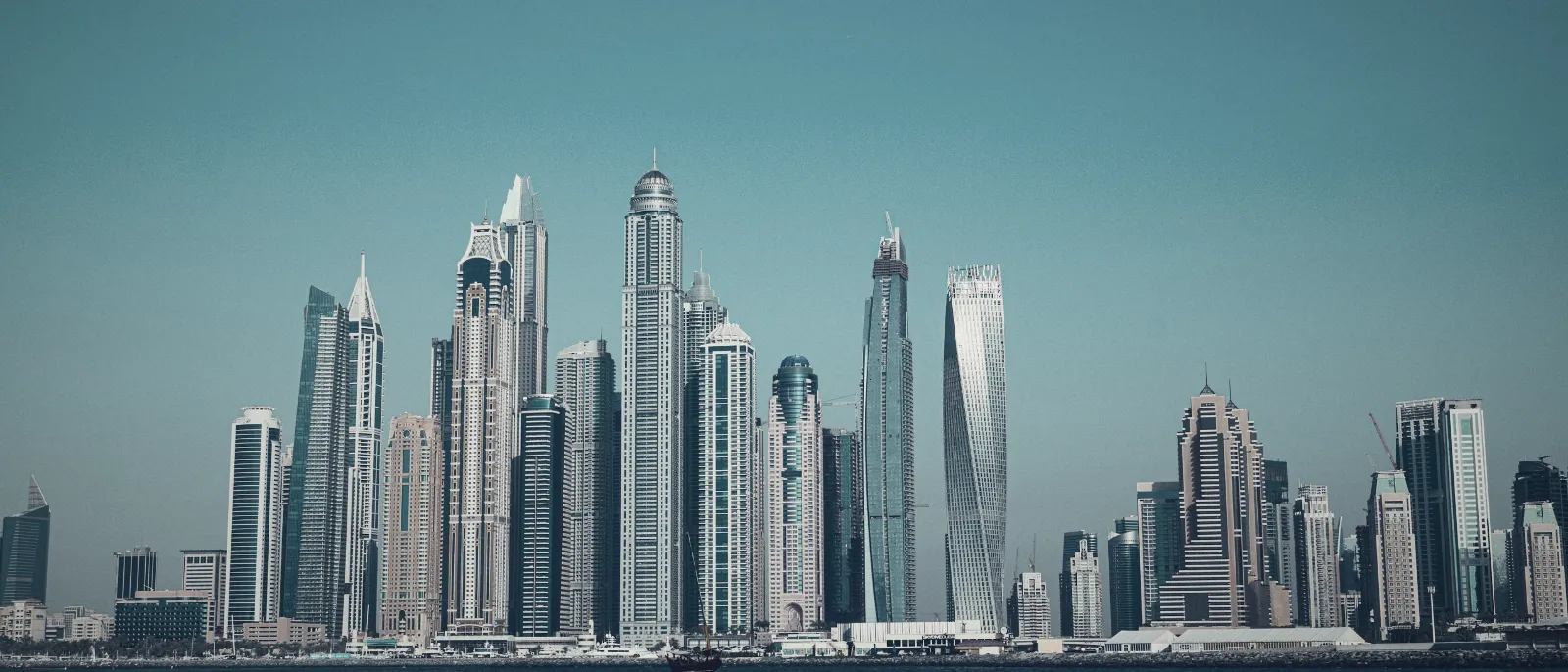 Dubai Marina skyline across the water in daylight